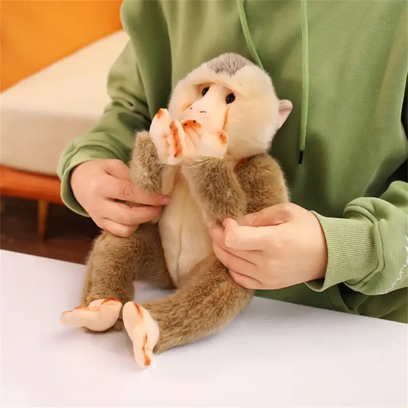 peluche babouin