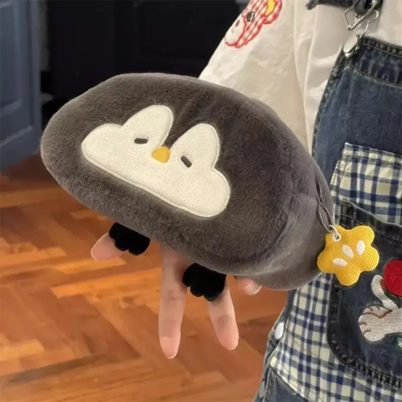 trousse pingouin