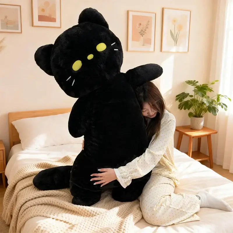 chat en peluche geant