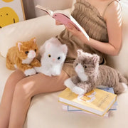 chat peluche miaule