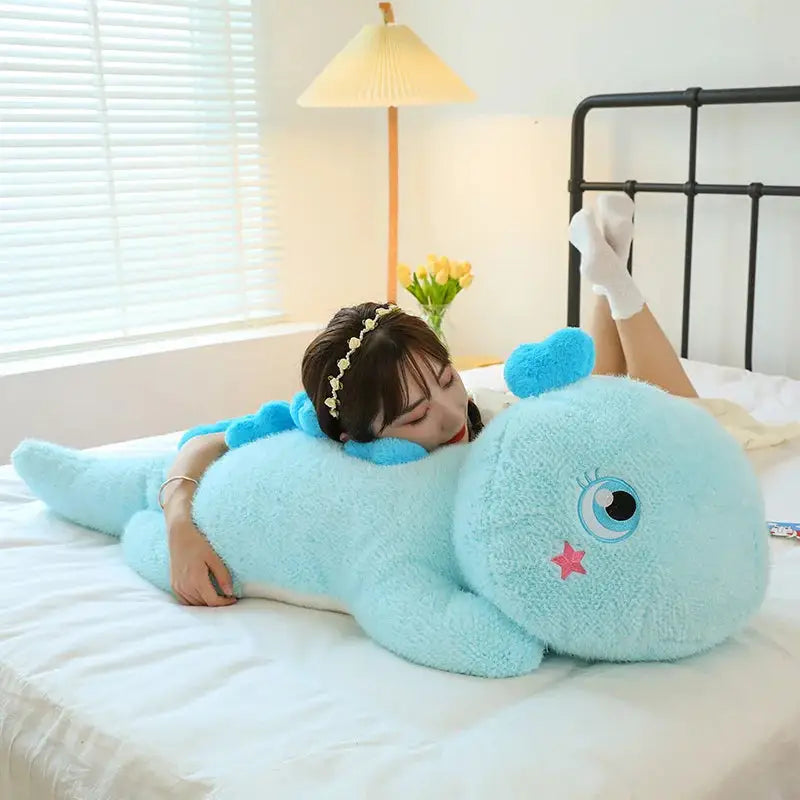 peluche dinosaure bleu