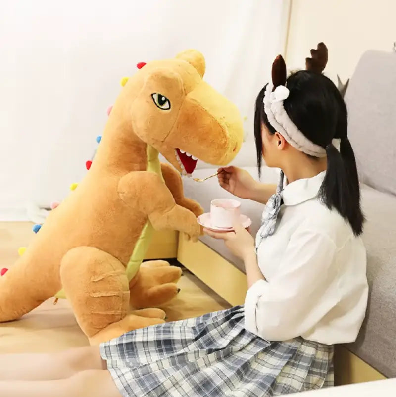 peluche dinosaure orange