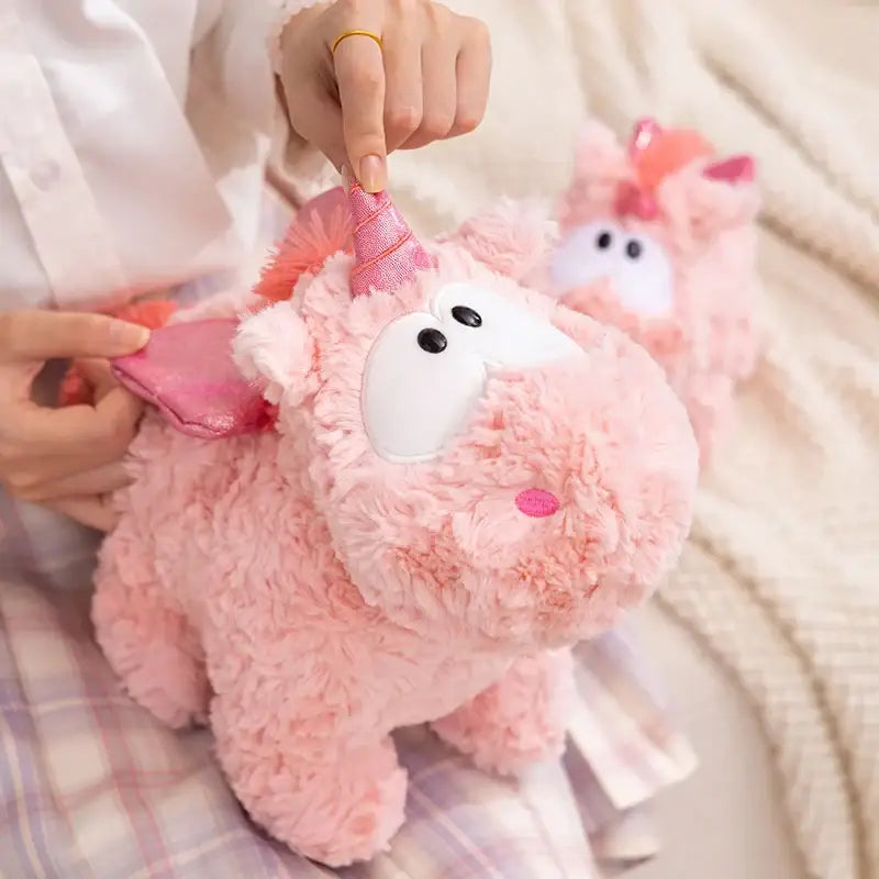 licorne peluche gros yeux