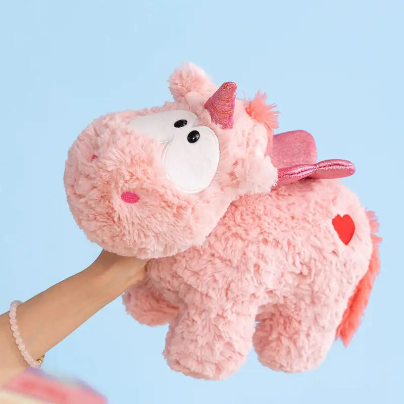 licorne peluche gros yeux