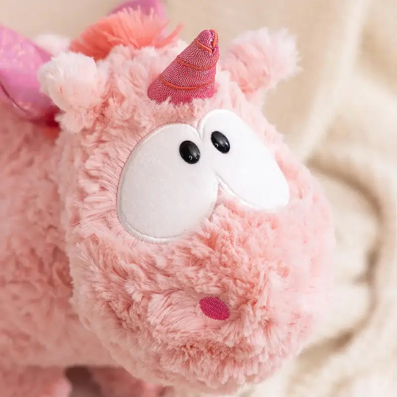 licorne peluche gros yeux