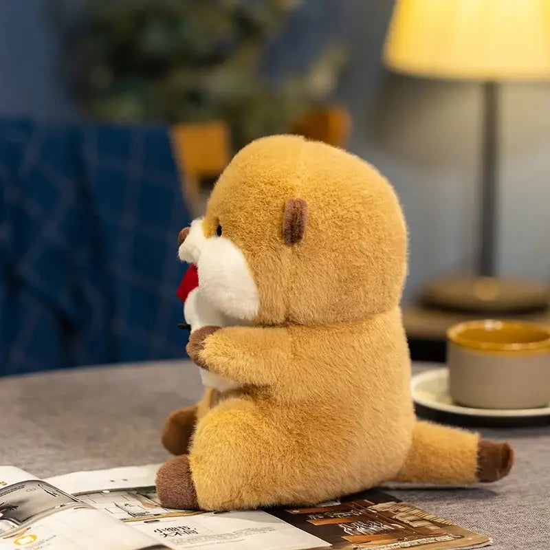 peluche loutre bébé