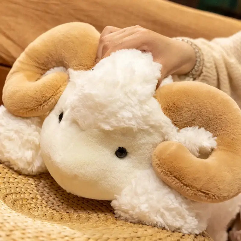 mouton en peluche blanc