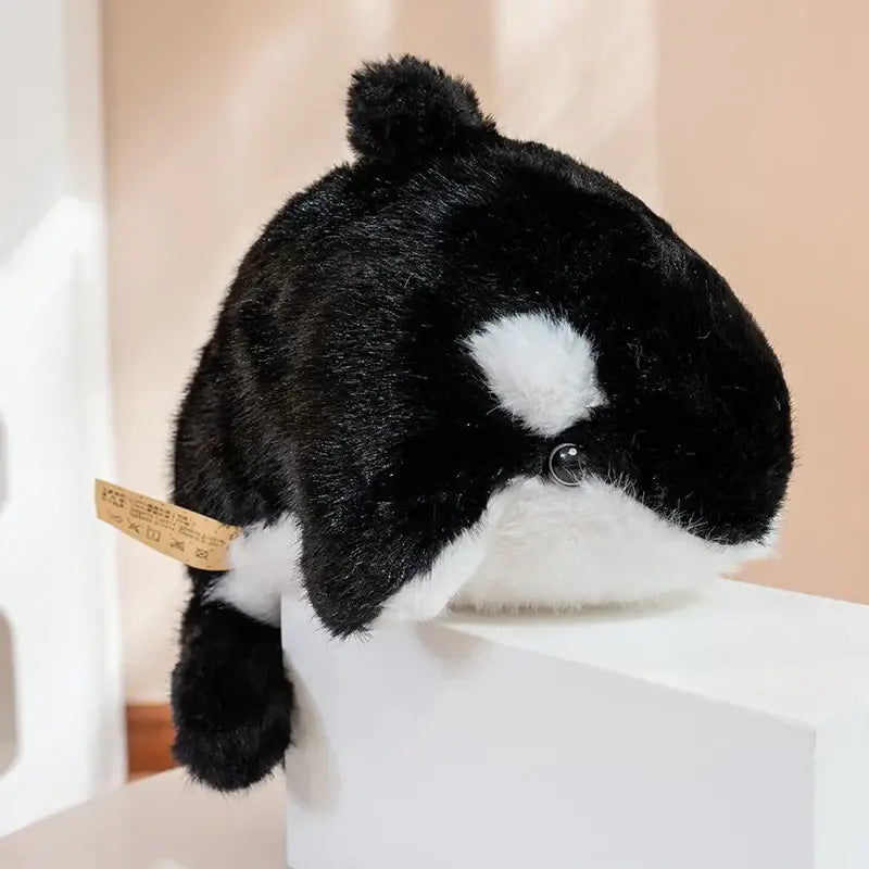 orque en peluche