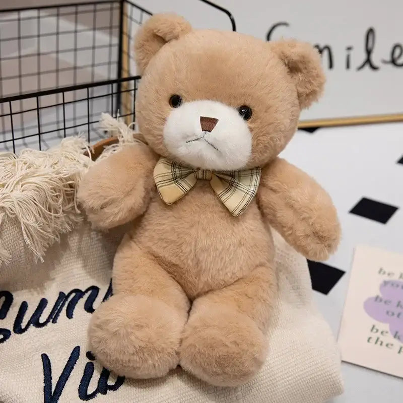 ours en peluche nœud papillon - Brun
