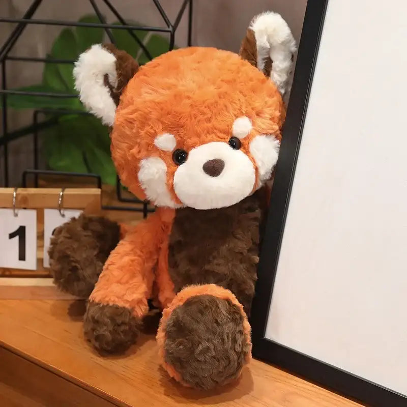 panda roux en peluche