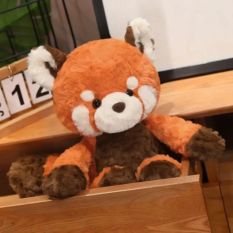 panda roux en peluche