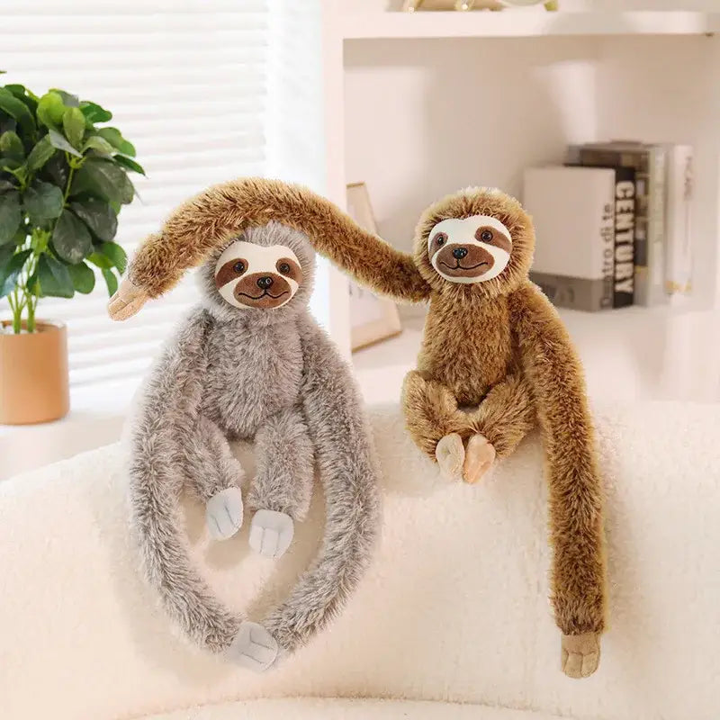paresseux peluche bebe