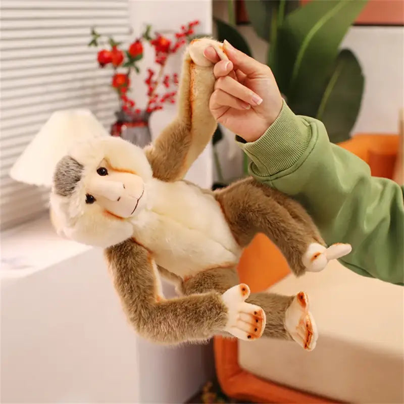 peluche babouin