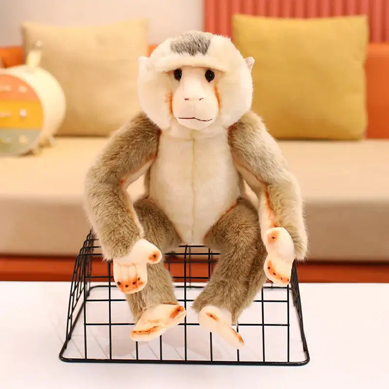 peluche babouin