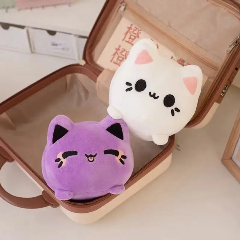 peluche boule chat