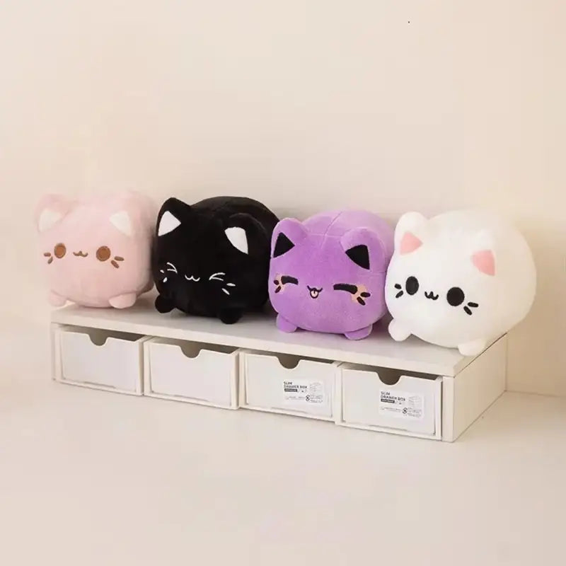 peluche boule chat