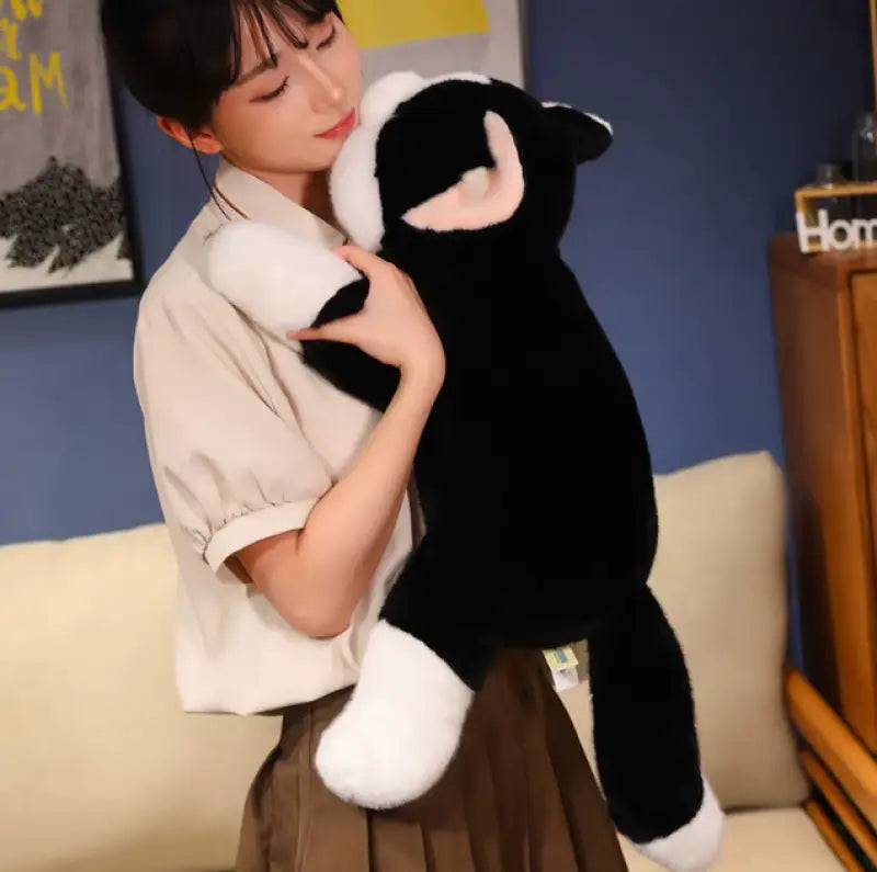 peluche chat blanc et noir
