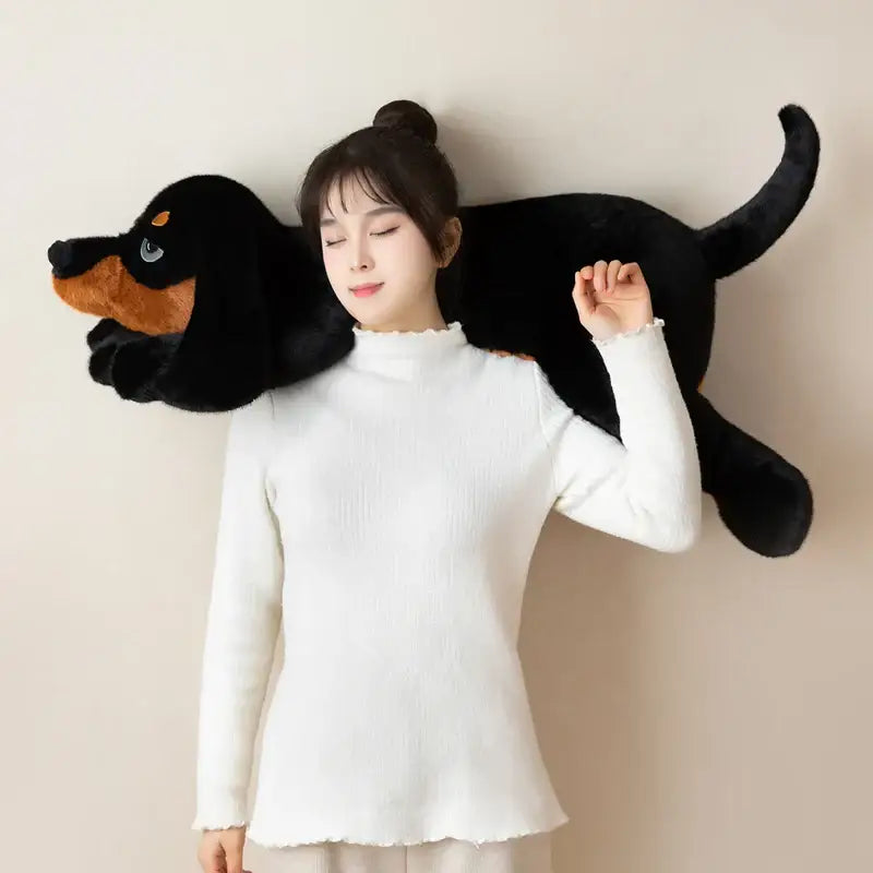 peluche chien noir et marron