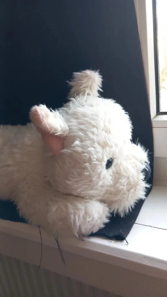 peluche chien westie blanc prise de profil