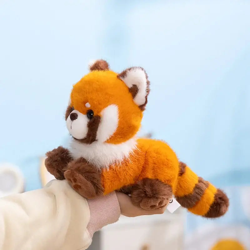 peluche de panda roux