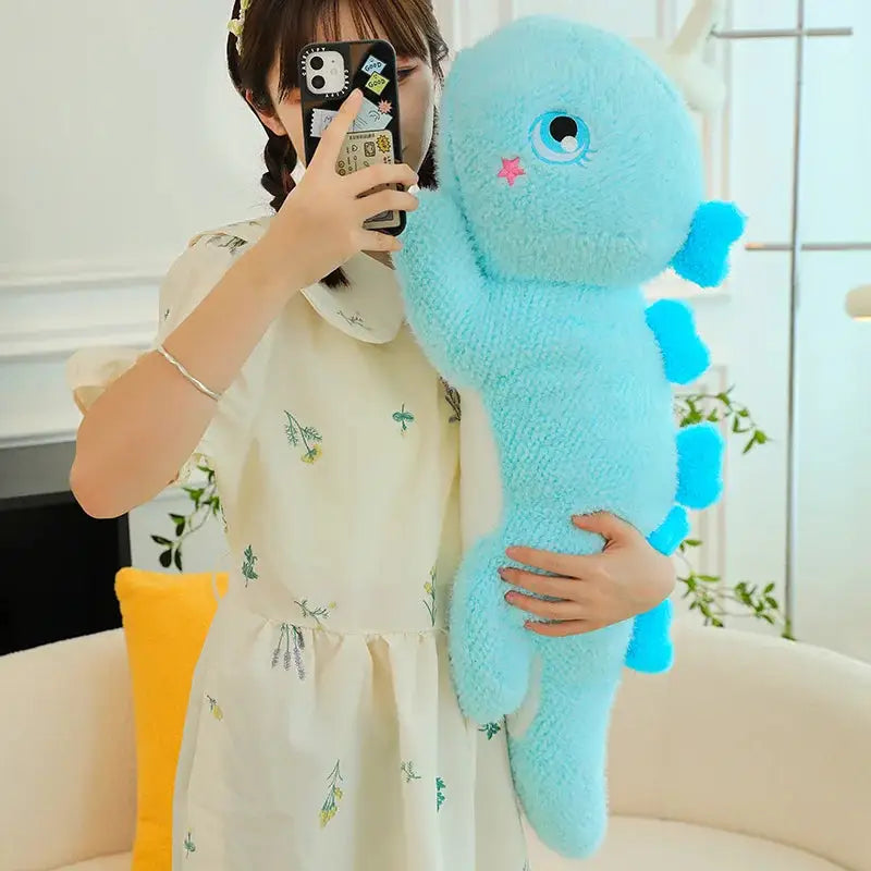 peluche dinosaure bleu