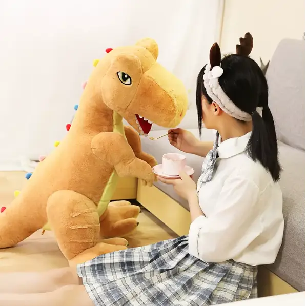 peluche dinosaure orange