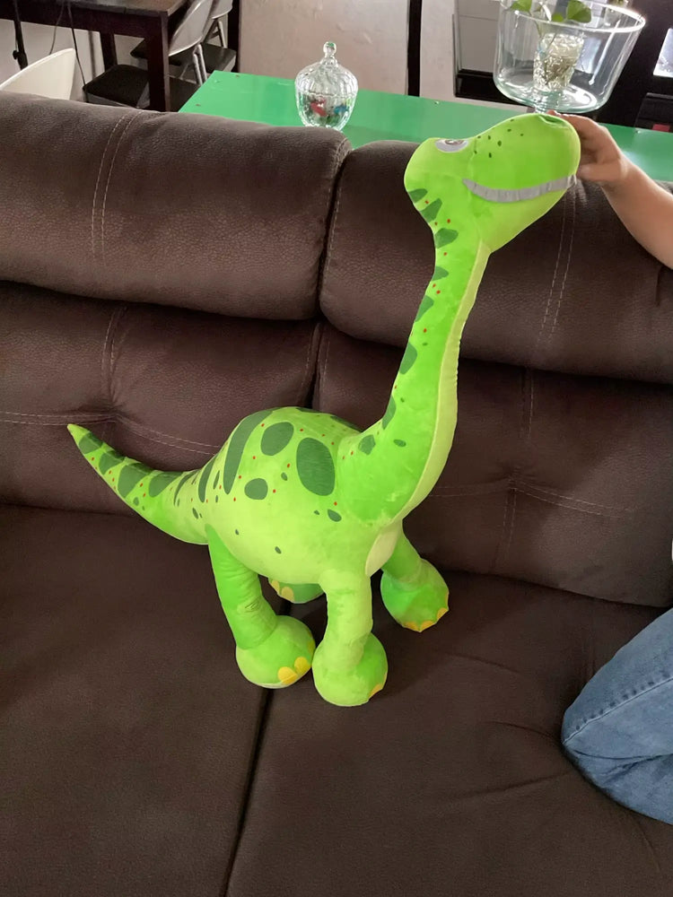 Grande peluche dinosaure vert à long cou avec taches, jouet doux et décoratif pour enfants.