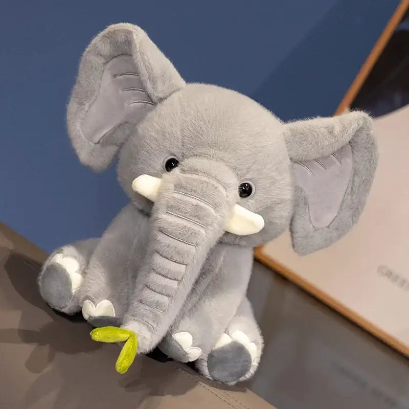 peluche éléphant gris