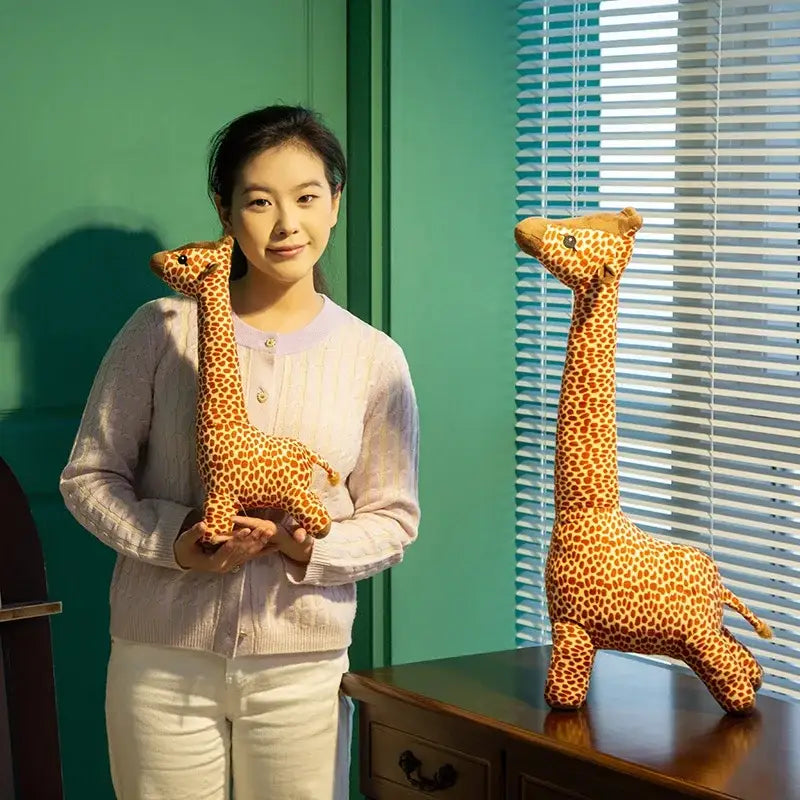 peluche girafe gros yeux