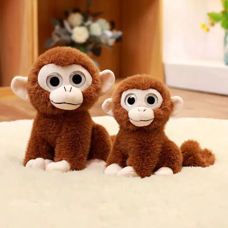 peluche gros yeux singe