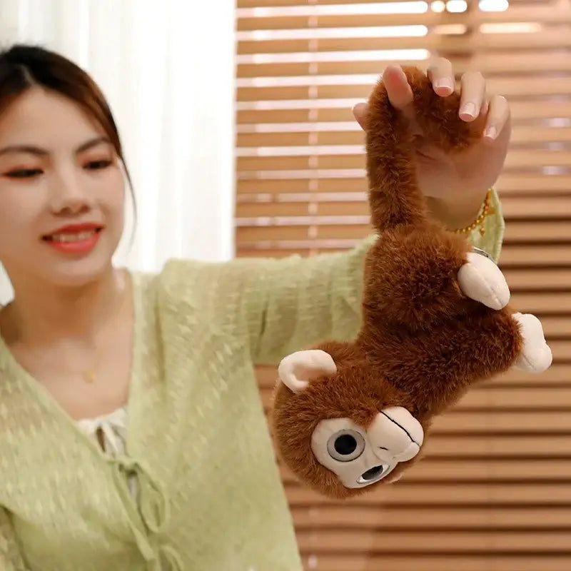 peluche gros yeux singe