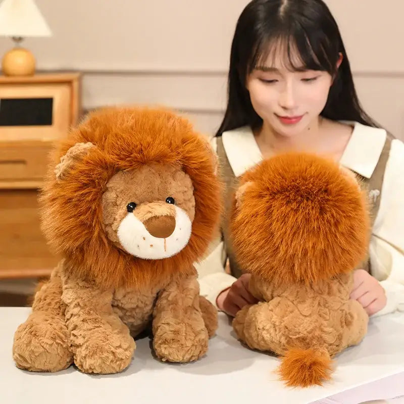 peluche lion bebe