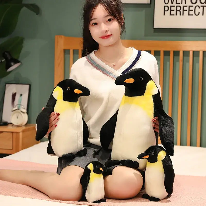 peluche pingouin gros yeux