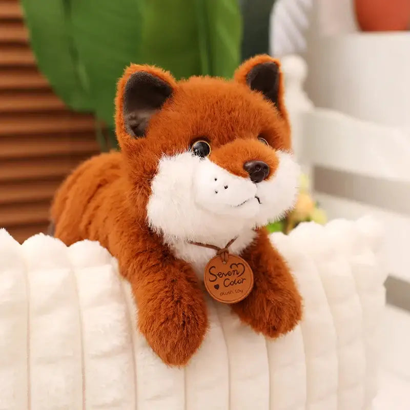 peluche renard gros yeux