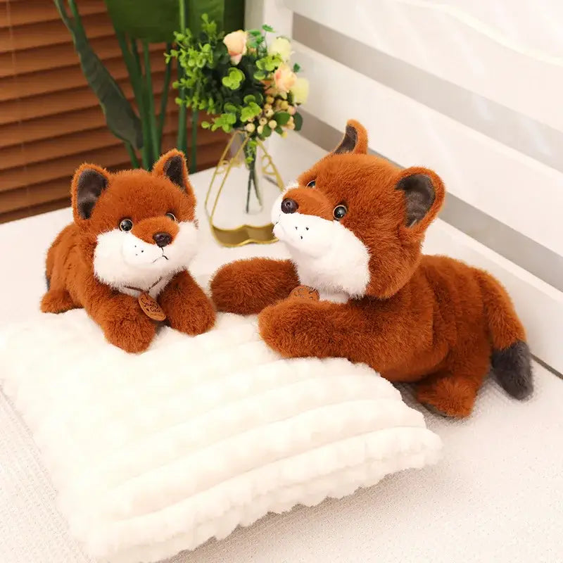peluche renard gros yeux