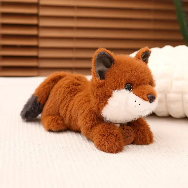 peluche renard gros yeux - Couché / 25cm