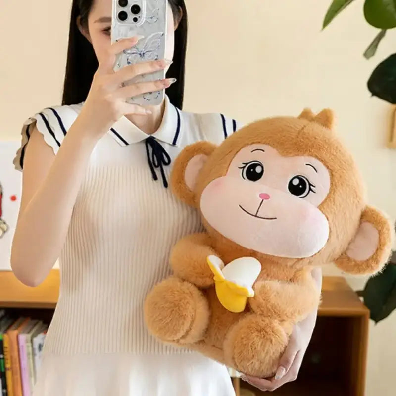 peluche singe avec banane