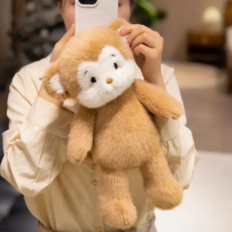 peluche singe marron