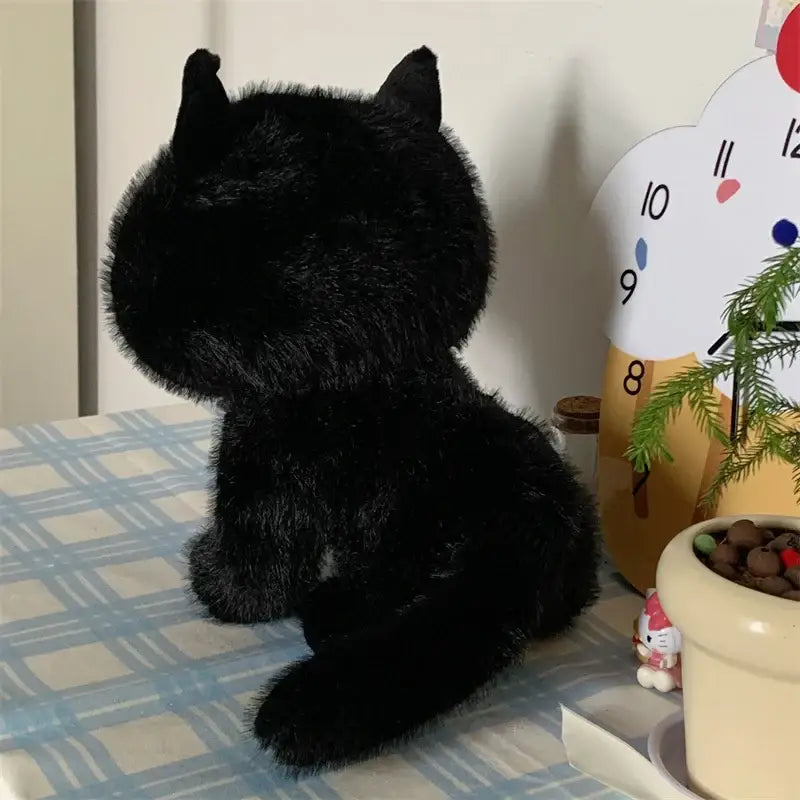 petit chat en peluche