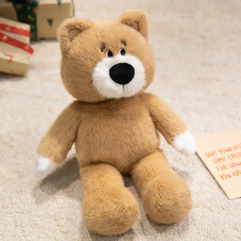petit ours brun en peluche