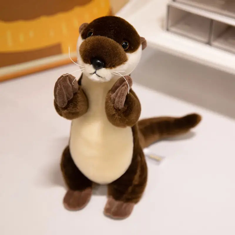 petite loutre peluche - Debout