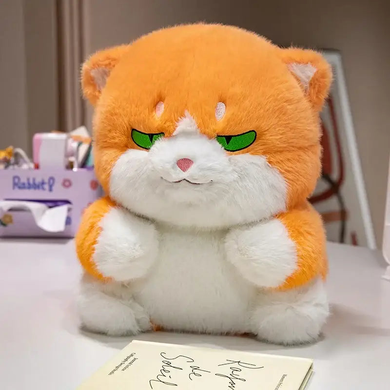 chat roux en peluche