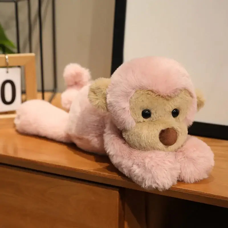 singe en peluche - Rose