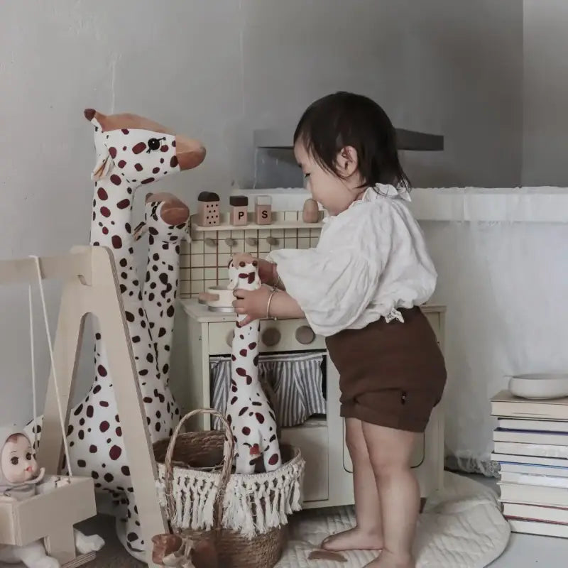grande girafe en peluche