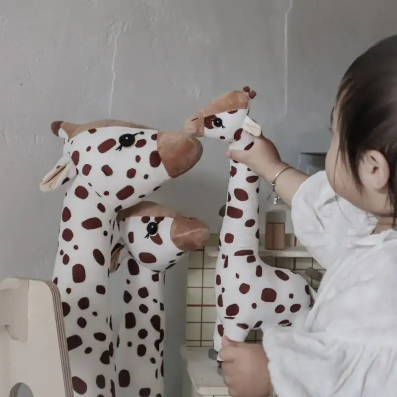 grande girafe en peluche