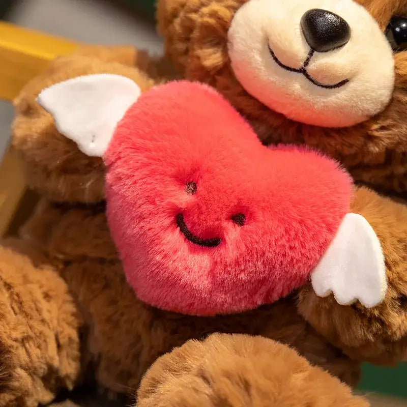 ours en peluche avec coeur